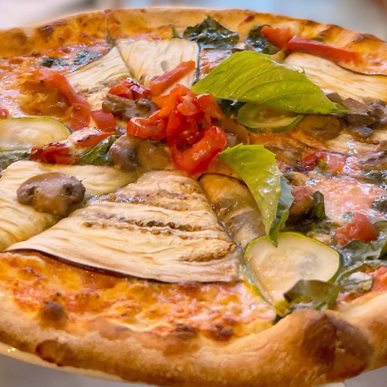 Savor our vegan pizza